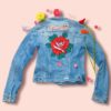 tatouage en broderie sur veste en jeans femme vintage